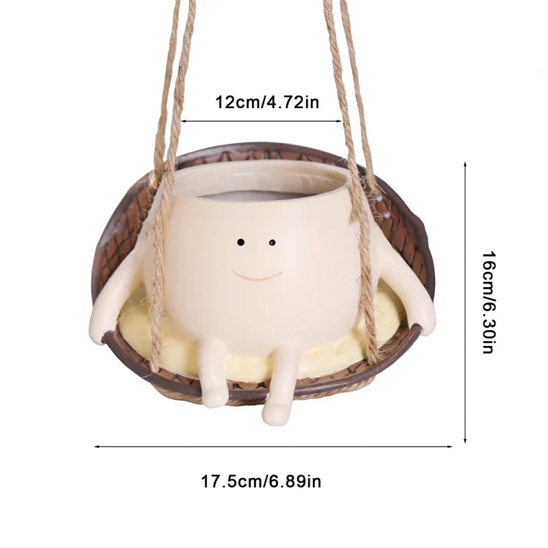 Iloiset keinuvat kasviruukut