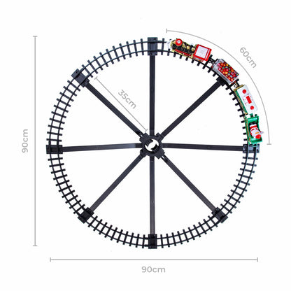 Joulukuusijuna – veturi ja 3 vaunua rautatiekiskoilla